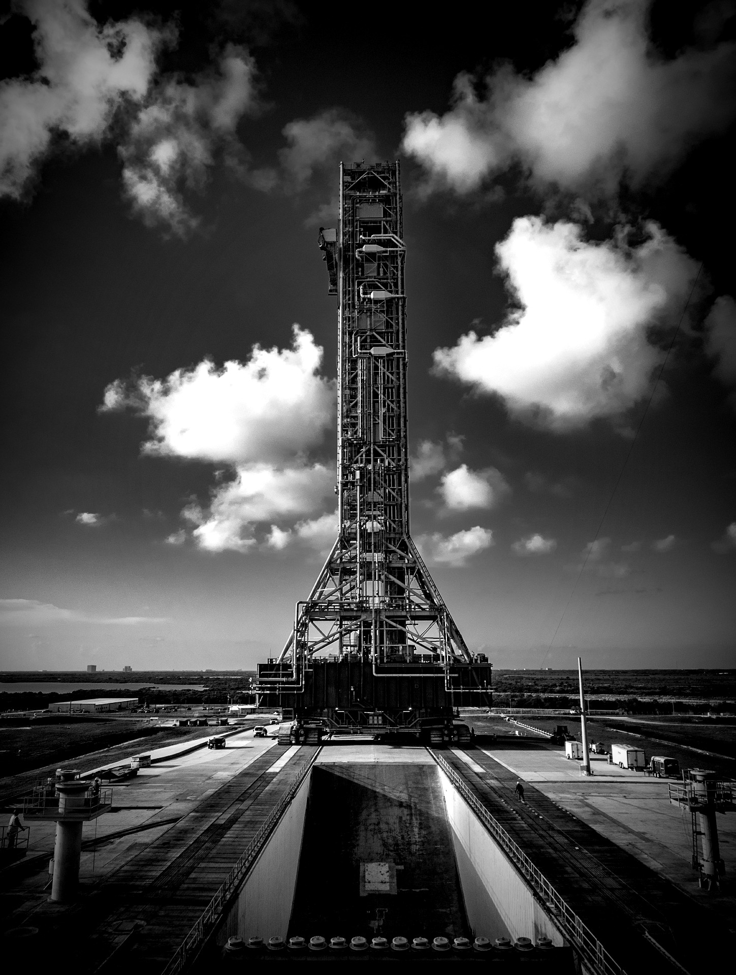 grayscale shot tower holding sls rocket kennedy space center